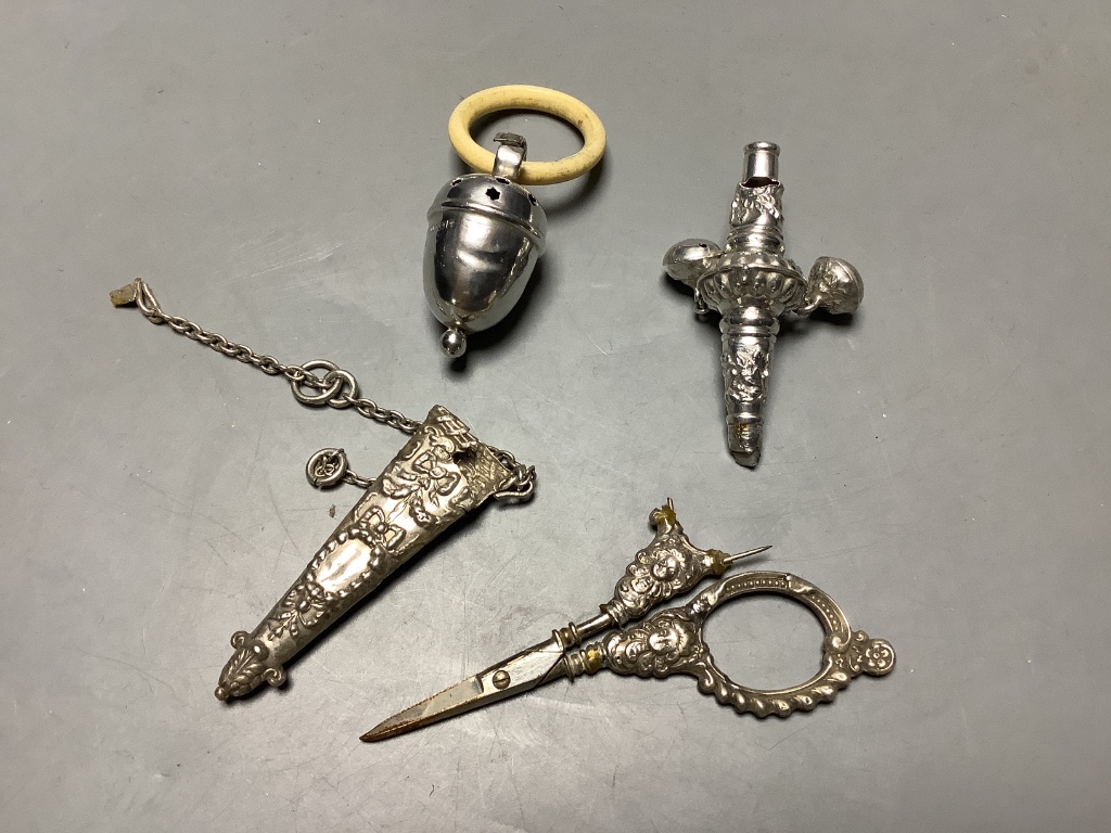 Two silver baby's rattles (a.f.), a Dutch white metal pill box, a silver two handled salt and four plated items.